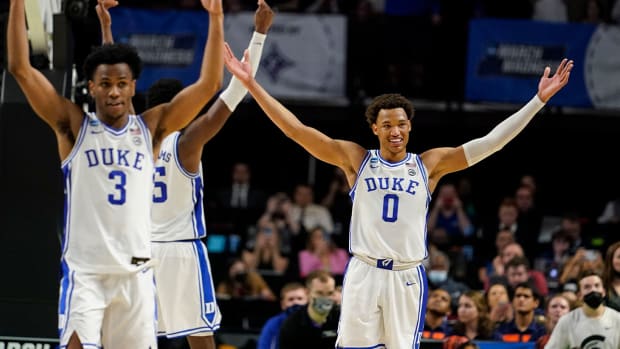 Duke’s Jeremy Roach (3) and Wendell Moore Jr. (0) celebrate after a win against Michigan State in a college basketball game in the second round of the NCAA tournament, Sunday, March 20, 2022, in Greenville, S.C.